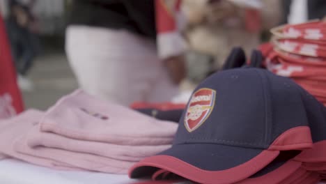 Arsenal-FC-football-merchandise-sold-at-a-stall-outside-the-Emirates-Stadium-in-London
