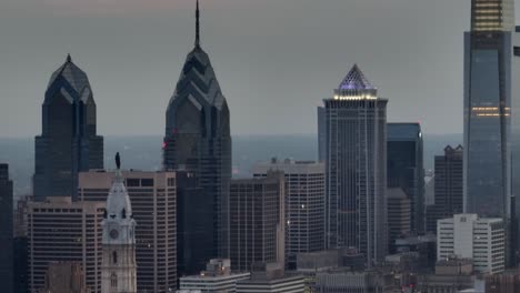 Long-aerial-zoom-of-Philadelphia-city-skyline-at-dusk