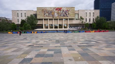 Tirana-Main-Square-with-the-Iconic-Façade-Mosaic-of-the-National-Museum,-a-Kaleidoscope-of-Colors,-Welcoming-Visitors