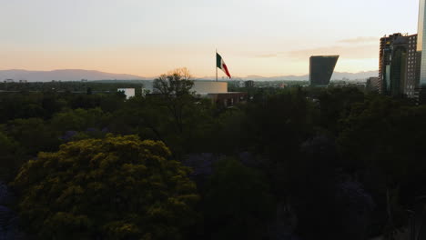 Aerial-view-rising-toward-the-Auditorio-Nacional,-sunny-evening-in-Mexico-city