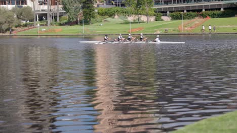 Group-of-People-Rowing-a-Row-Boat-in-the-River-Torrens-Near-Adelaide-Convention-Centre-and-Sky-City-Casino-Adelaide-South-Australia