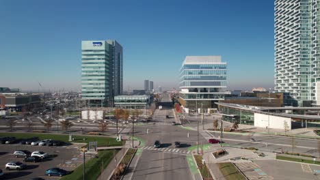 Downtown-city-center,-Urban-hub-with-high-rise-office-buildings,-surrounded-by-an-urban-park-plaza