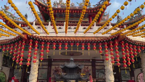 Iconic-and-charming-architecturally-picturesque-temple-adorned-with-yellow-lanterns-of-the-birthday-celebration-of-Mazu-in-Thean-Hou-Temple,-Kuala-Lumpur,-Malaysia