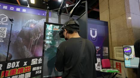 A-guy-playing-virtual-reality-shooting-games