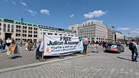 April-21---2023---Banner-Saying-Free-Julian-Assange-Being-Held-During-Peaceful-Protest-Outside-US-Embassy-Beside-Brandenburg-Gate