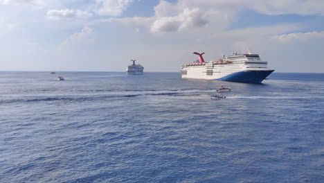 Two-luxury-Carnival-cruise-ships-embarked-from-port-|-Carnival-cruise-ship-prepared-to-embark-in-Caribbean-sea-turns-and-drifts-near-a-port
