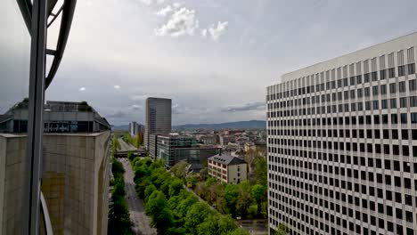 High-Angle-Shot-Looking-Across-Theodor-Heuss-Allee-Road-With-Office-Buildings-In-View-In-Frankfurt