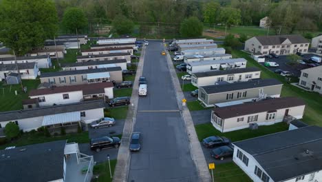 Aerial-establishing-shot-of-mobile-homes-at-dusk