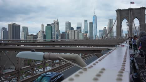 Manhattan-Skyline-Seen-From-Walkway-On-Brooklyn-Bridge