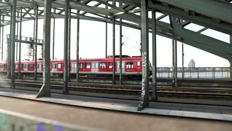 Cologne,-Germany:-Shot-of-train-moving-on-Hohenzollern-Bridge,-Cologne,-Germany,-Europe-at-daytime