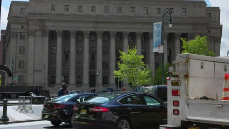 Thurgood-Marshall-United-States-Courthouse-With-Traffic-Going-Past