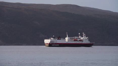Hurtigruten-Ferry-Boat-With-Passengers-Cruising-In-The-Ocean