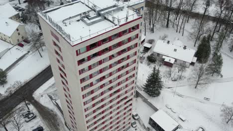 Pan-drone-shot-of-Eesti-Maaülikool-dormitory-Torn-university-in-Tartu