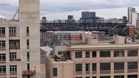 Aerial-reveal-of-Colorado-Rockies,-Coors-Field-MLB-stadium-in-Denver,-CO