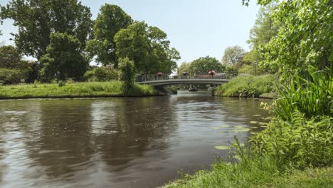 Canal-Tour-Near-The-Plantsoen-And-Van-Disselbrug-Bridge-In-Leiden,-Netherlands