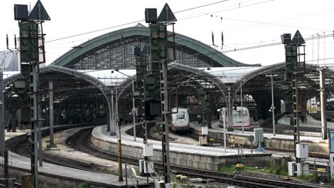 View-From-Heinrich-Boll-Platz-Looking-At-Cologne-Central-Station-With-DB-ICE-Trains-Waiting-At-Platforms