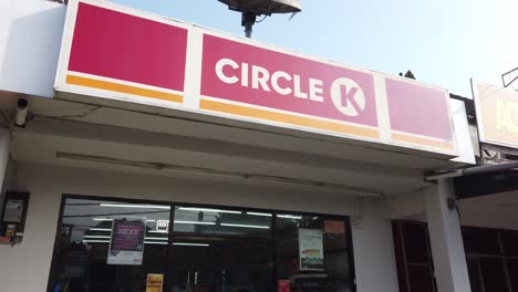 Circle-K-Urban-Market-in-Indonesia-Shop-Entrance-Brand-Design-Logo-Mini-Super-from-Outside,-Street-View,-Establishing-Shot