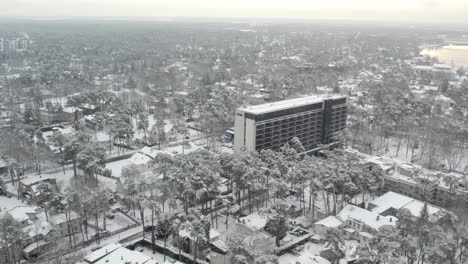 drone-shot-of-snowy-Jurmala-Hotel-Spa-on-background-you-can-see-rivers-coming-from-Riga