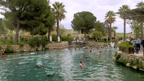 People-enjoy-bathing-in-ancient-Turkish-hot-mineral-spring-spa-waters