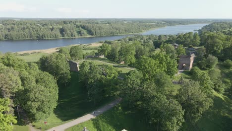 drone-shot-of-aerial-of-Viljandi-castle-ruins-in-top-of-the-hill-in-Estonia