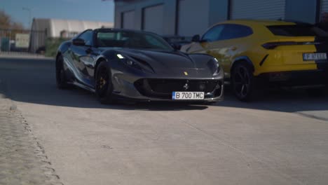 Slow-motion-shot-of-black-Ferrari-coming