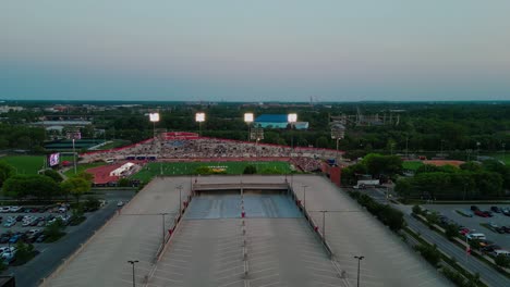 Aerial-view-college-sports-and-stadium-with-parking-lot-in-America