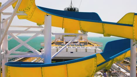 Costa-Serena-Upper-Deck-Water-Slide-with-Ocean-Background