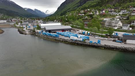 Tenden-transport---Aerial-showing-company-trucks-and-site-in-village-of-Stryn-Norway
