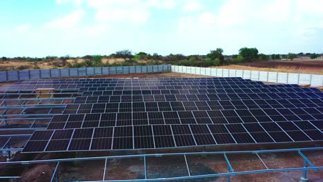 Aerial-camera-moving-back-from-above-solar-power-station