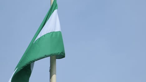 Flag-of-Rotterdam-In-Wind-Against-Clear-Blue-Sky