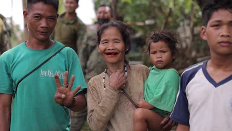 Tribal-Ethnic-Mountain-Peoples-Woman-Holding-Baby-Sad-Young-Ethinc-Asian-Girl-In-Small-Remote-Village-Indigenous-Asia