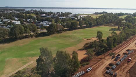 Yarrawonga,-Victoria,-Australia---2-June-2023:-Aerial-reveal-of-Lake-Mulwala-a-golf-course-and-earthworks-at-Silverwoods-Estate-in-Yarrawonga-Victoria