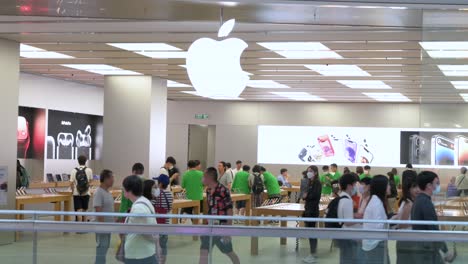 Chinese-shoppers-are-seen-at-the-American-multinational-technology-company-Apple-store-and-logo-in-Hong-Kong