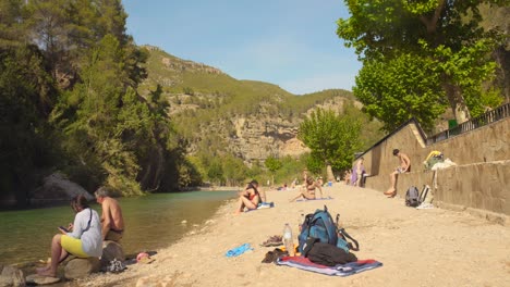 Tourists-During-Holiday-On-The-Spring-Baths-Of-Fuente-de-los-Baños-In-Montanejos,-Spain