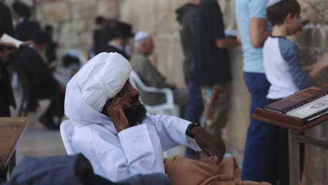 Portrait-Of-Muslim-Ethnicity-Man-Sitting-On-Steps-Of-Mosque