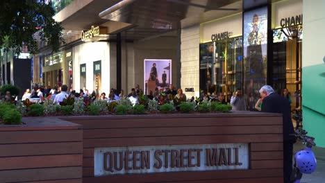 Bustling-downtown-Brisbane-CBD,-large-crowds-of-people-strolling-and-shopping-at-iconic-Queen-street-mall-on-a-sunny-day,-Queensland,-the-sunshine-state-of-Australia,-static-shot