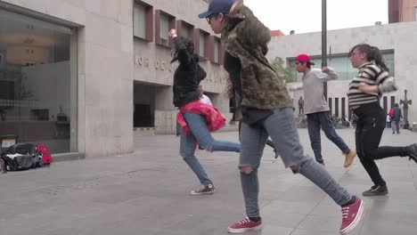 Young-multiracial-people-dancing-urban-style-in-slow-motion-in-the-street