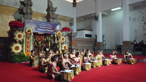 Balinese-Gamelan-Music-and-Theater-Performance-on-Stage-at-Bali-Indonesia,-Art-and-Culture,-Performers-wearing-Traditional-Clothes