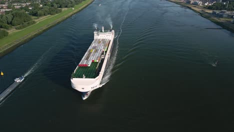 A-roll-on-roll-off-cargo-ship-with-container-trailers-passes-under-a-drone