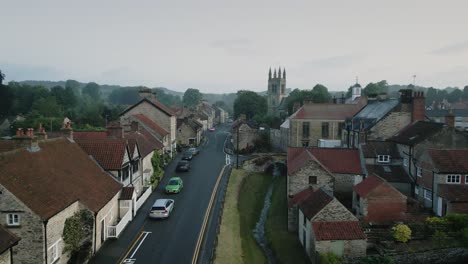 Drone-clip-at-low-level-along-a-popular-tourist-street-but-it-is-very-early-in-the-morning-and-nobody-is-about