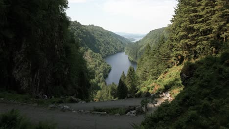 Drone-Video-of-Kossdalssvingene-Merely-Passing-Over-Greenery-Revealing-Beautiful-Nature-in-Osterøy,-Norway