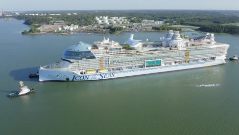 Worlds-largest-cruise-ship-ICON-OF-THE-SEAS-departing-for-sea-trials-from-Meyer-Turku-assisted-by-tug-boats