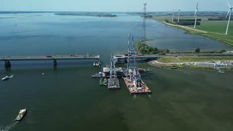 The-moving-part-of-the-Haringvliet-Bridge-is-suspended-in-the-floating-crane