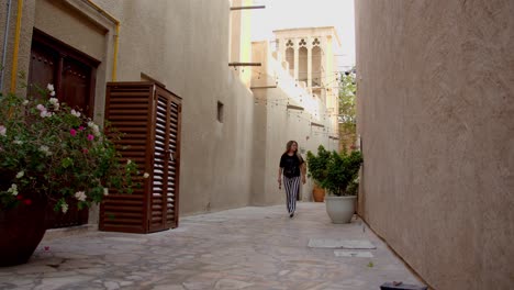 Al-Fahidi-is-known-for-its-Historical-Neighborhood,-with-traditional-buildings-like-18th-century-Al-Fahidi-Fort,-now-home-to-Dubai-Museum's-pearl-diving-exhibits