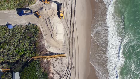 straight-overhead-aerial-shot-of-excavation-work-happening-on-the-beach