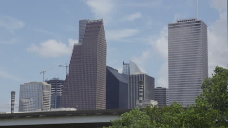 A-few-tall-buildings-in-downtown-Houston,-Texas-on-a-sunny-day