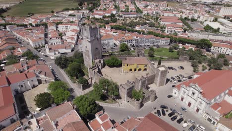 Aerial-view-of-medieval-Castle-of-Beja-and-town-panorama,-Portugal,-establishing-shot