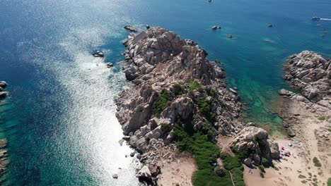 Aerial-panning-view-over-sea-landscape-and-white-rocks