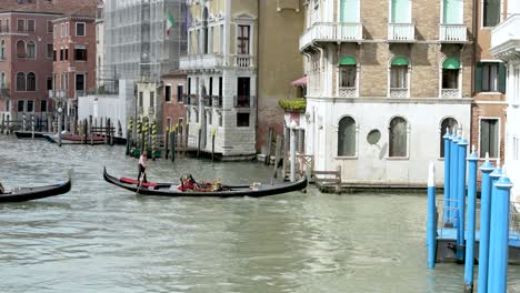 Gondola's-Passing-Each-Other-Along-Grand-Canal-In-Venice
