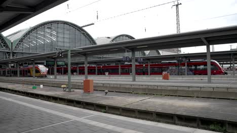 A-cinematic-view-of-the-Frankfurt-station-where-a-train-about-to-leave-from-the-station-in-the-morning